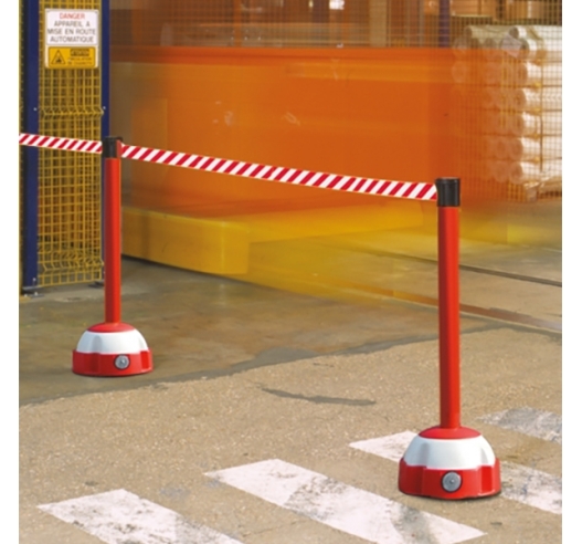 Red And White Belt Barrier In Use