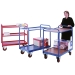 Group of Tray Trolleys In Blue And Red