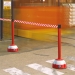 Red And White Belt Barrier In Use